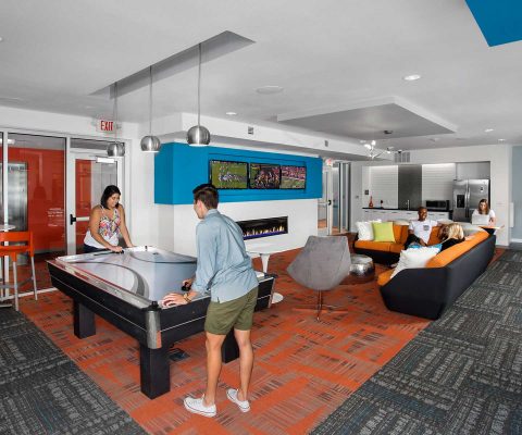 Air hockey table in The Edge student apartments community area