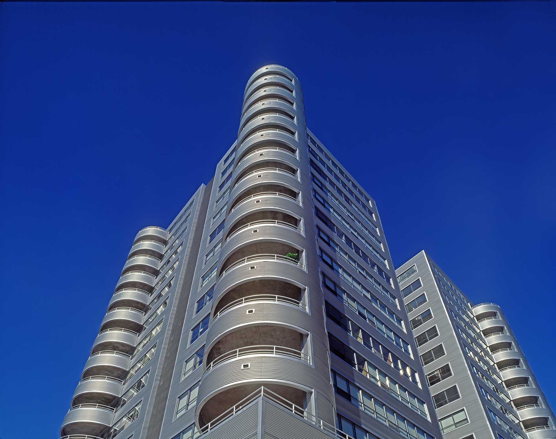 Silver corrugated aluminum panel exterior at Marina Condominiums